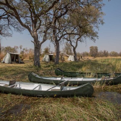 canoe trail, canoes and camp